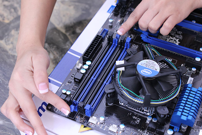 Pulling back DIMM slot clips